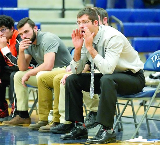 Eagles enjoying new coach, success on mats